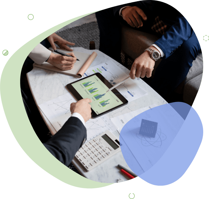 Team discussing financial reports and data analytics during a business strategy meeting - audit services in australia